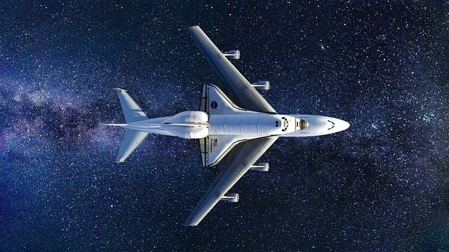 An airplane is carrying a space shuttle in space