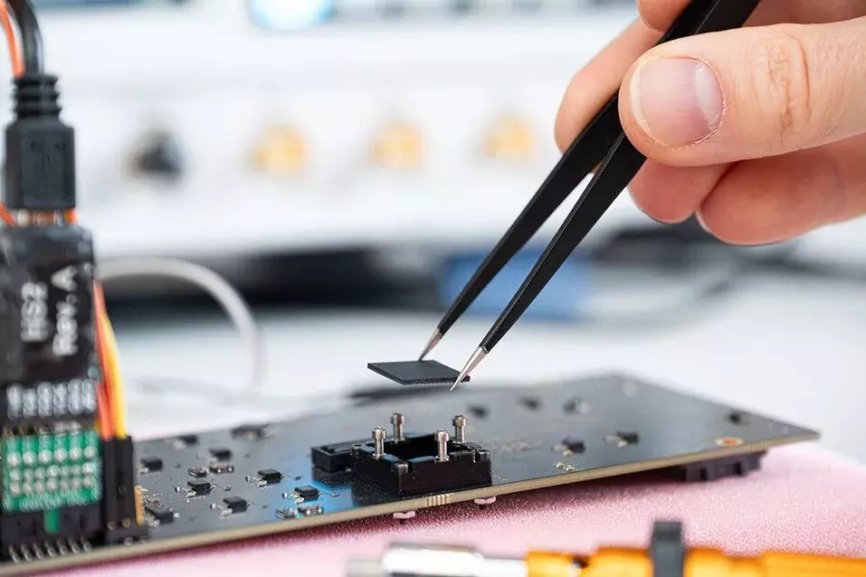 The Masur25 chip is inserted into the socket on the evaluation board.