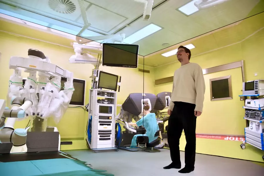 A person in an immersive operating room installation on the holodeck.